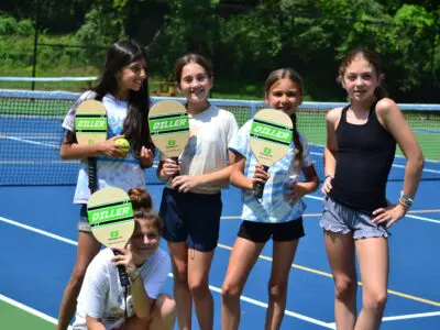 Campers playing pickleball